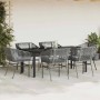 7-teilige Garten-Essgruppe vidaXL aus grauem Rattan mit schwarzem Tisch und hellgrauen Kissen.
