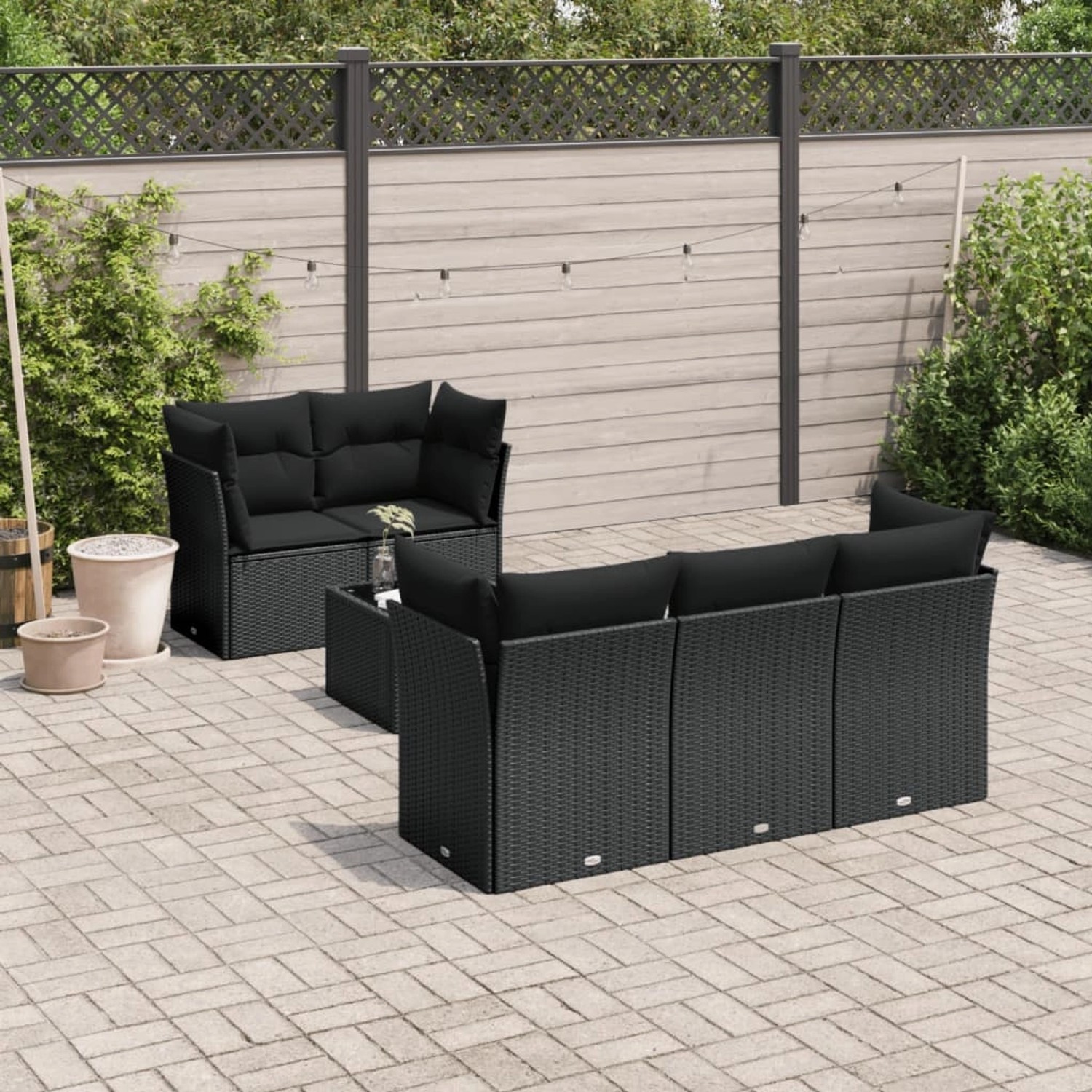 Schwarze 6-tlg. vidaXL Garten-Sofagarnitur aus Poly Rattan mit Kissen für Terrasse und Garten.