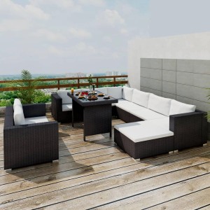 Schwarzes 10-tlg. vidaXL Garten-Lounge-Set aus Rattan mit Auflagen und Esstisch auf einer Terrasse.