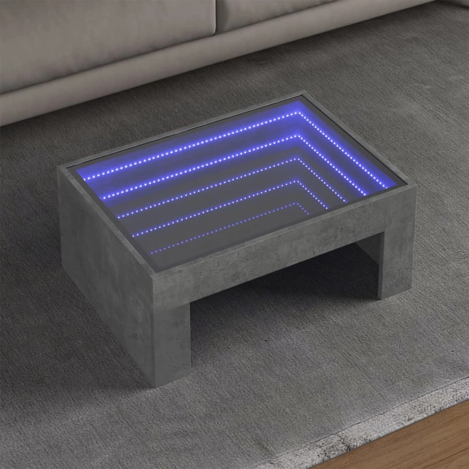 Betongrauer Couchtisch mit Infinity-LED-Spiegel für Wohnzimmer.