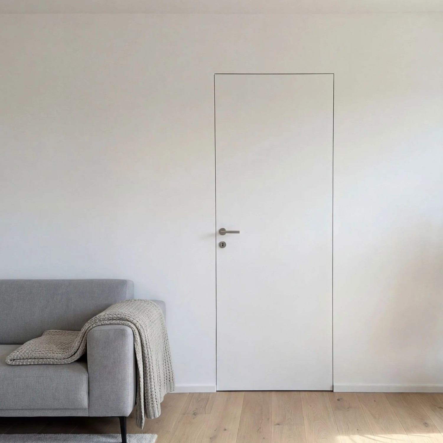 Wandbündige, weiße Tür mit Zarge im Komplettset SecretLine, 76x201 cm.