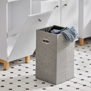 SoBuy Wäscheschrank BZR93-W mit grauem Wäschesack und weißer Schublade im Bad.