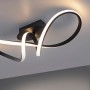 Moderne LED-Deckenleuchte Maria von Just Light, 61x24,5 cm, in Schwarz mit geschwungenem Design.