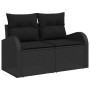 Schwarzes 6-teiliges Garten-Sofa-Set aus Poly Rattan mit Kissen.