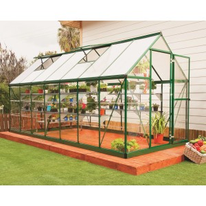 Palram Canopia Hybrid Gewächshaus (4.3x1.9) in Grün mit klaren Seitenwänden, bepflanzt.