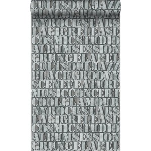 Vliestapete mit Muster aus alten eisernen Druckbuchstaben in Lagunengrün. Industrial Chic Design mit Metallic-Glanz.