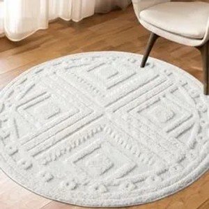 Runder, pastellcremefarbener Hochflor Teppich Nara mit Rautenmuster, 200x200 cm.