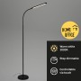 Schwarze, dimmbare Brilo LED Stehleuchte Pivaz mit Touch-Funktion und schwenkbarem Kopf.