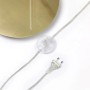 Goldener Lampenfuß, Kabel mit transparentem Fußschalter und Stecker der Lindby Bogenlampe.