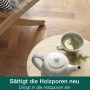 Bona Parkettpflegeöl neutral auf geöltem Holzboden mit Teekanne und Tasse.