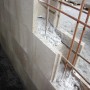 Grauer Schalungsstein (50x25x24 cm) als Mauerstein für Mauern und Fundamente.