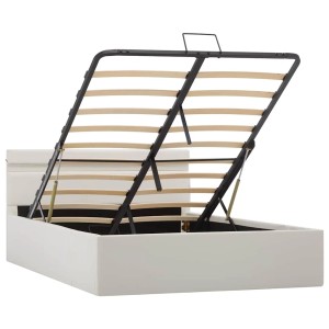 Weißes Stauraumbett mit Lattenrost und hydraulischem Hebemechanismus, geöffnet.