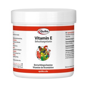 Quiko Vitamin E Ergänzungsfutter für Vögel, Dose mit Ziervogel-Motiv.