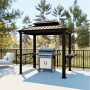 Anthrazitfarbener Sojag Grillpavillon Messina BBQ mit Grill und Ablagetischen im Garten.