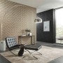 Wohnraum mit goldener 3D Grafik Vliestapete Spotlight von Erismann, moderne Raumgestaltung.