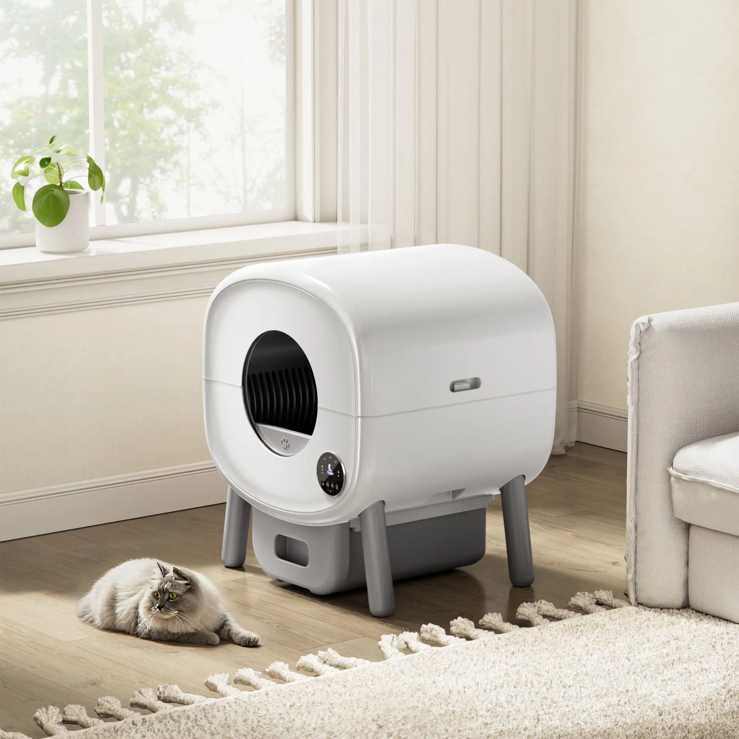 Weiße Fudajo selbstreinigende Katzentoilette 76L mit Katze auf Holzboden. Modernes Katzenklo mit App-Steuerung.