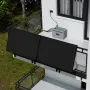 Growatt NEXA 2000 Erweiterungsbatterie mit Solarmodulen auf einem Balkon.