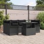 Schwarzes 7-teiliges vidaXL Garten-Sofa-Set aus Poly Rattan mit Tisch und Kissen.