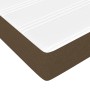 Detailansicht Boxspringbett Matratze, dunkelbrauner Stoff, weiße Oberfläche. Bequemes Bett für erholsamen Schlaf.