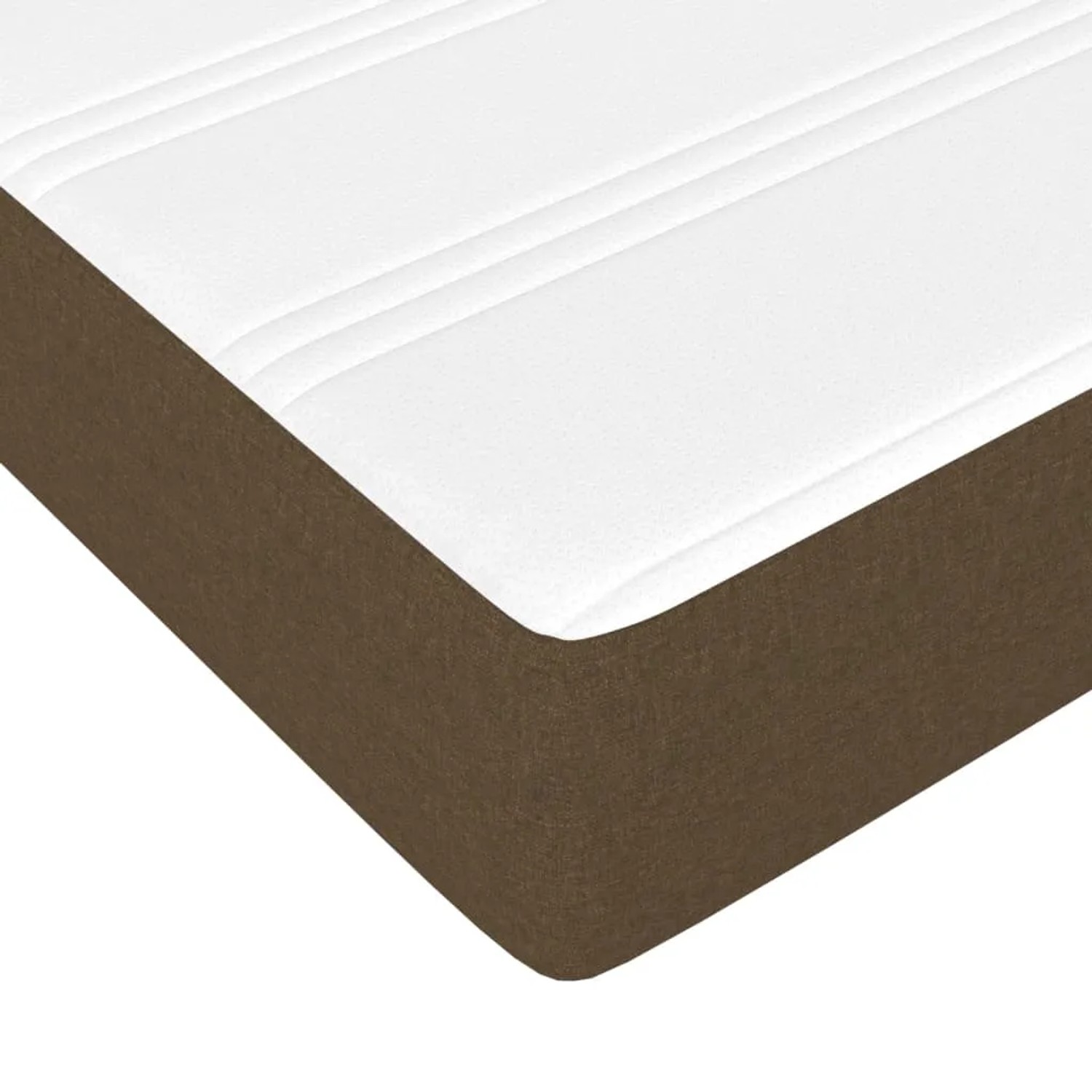 Detailansicht Boxspringbett Matratze, dunkelbrauner Stoff, weiße Oberfläche. Bequemes Bett für erholsamen Schlaf.