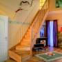 Dolle Wangentreppe Paris, 1/4 gewendelt, Buche mit Setzstufen. Holztreppe für Innenräume.