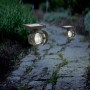 Solar-LED-Spot in Schwarz, warmweißes Licht, zur Beleuchtung von Gartenwegen und Pflanzen.