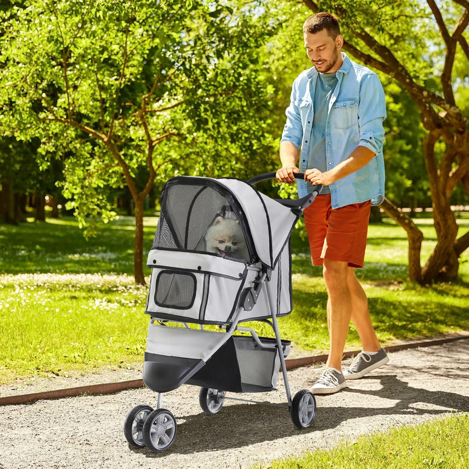 Heller PawHut Hundewagen/Buggy mit Hund im Park. Ideal für kleine Hunde und Katzen.