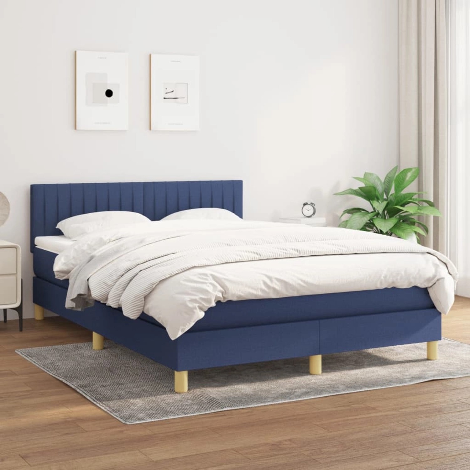 Blaues vidaXL Boxspringbett (140x190 cm) mit Matratze und Stoffbezug.