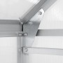 Detailaufnahme: Aluminiumrahmen und Schrauben des transparenten Tectake Gewächshauses.