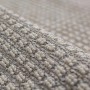Grauer Flair Rugs Kurzflorteppich Speckle. Detailansicht der weichen, waschbaren Boucle-Textur mit abstraktem Muster.