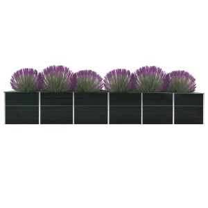 Anthrazitfarbenes vidaXL Garten-Hochbeet aus Stahl, 480x80x77 cm, bepflanzt mit Zierlauch.