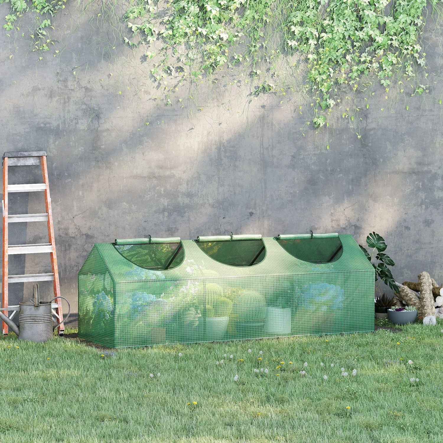 Grünes Furnicato Gewächshaus mit aufrollbaren Fenstern, 180x60x60 cm, im Garten.