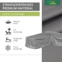 Graue Schutzhülle für eine L-förmige Loungegruppe, wasserdicht, UV- und frostbeständig.