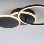 Moderne LED-Deckenleuchte Sevent von Just Light, schwarz, mit schwenkbaren Ringen.