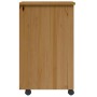 Honigbrauner Rollschrank aus massivem Kiefernholz, Seitenansicht mit sichtbarer Holzmaserung und Rollen.