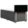 Dunkelgraues Boxspringbett 80x200 cm mit Matratze und Kopfteil.