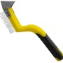 Gelber Steuber Fugenmesser mit Reinigungsbürste zum Entfernen von Fugenmaterial.