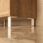 Weiße HEVVA LUXEMBURG Möbelfüße (10 cm) unter Holzschrank auf glänzendem Boden. Stabil & modern.