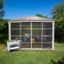 Sojag Pavillon Striano 10x12 Champagner mit Moskitonetz und Stahldach im Garten.