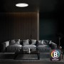 Dimmbare, schwarze Brilo LED-Deckenleuchte Ivy Sky S, 24W, in modernem Wohnzimmer.