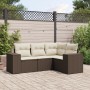 Braune 4-tlg. vidaXL Garten-Sofagarnitur aus Rattan mit cremefarbenen Kissen im Garten.