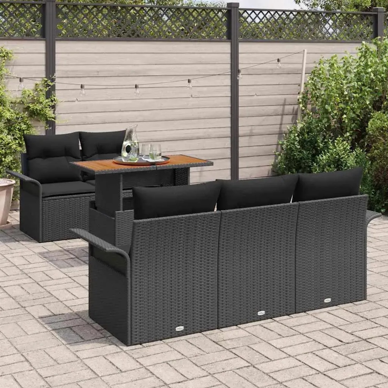 Schwarzes 6-tlg. vidaXL Garten-Sofa-Set aus Poly Rattan mit Tisch und Stauraum.