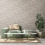 AS-Creation Vliestapete Steinoptik beige-braun, glänzend, an Wand hinter Sofa.