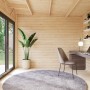 Innenansicht: Palmako Holz-Gartenhaus mit Pultdach, unbehandelt, als Büro eingerichtet.
