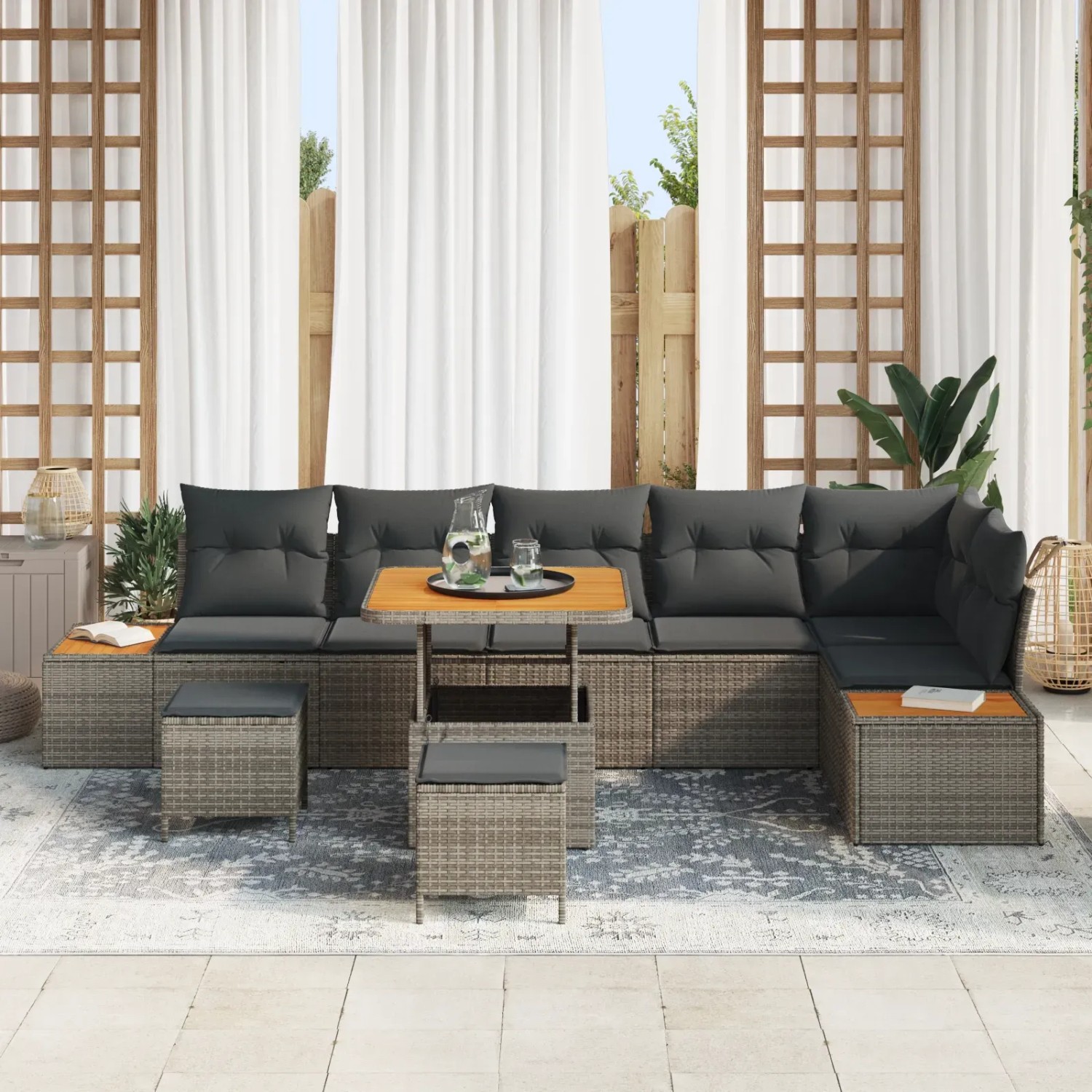 Graues 9-teiliges Garten-Sofaset aus Poly Rattan und Akazienholz mit Kissen.
