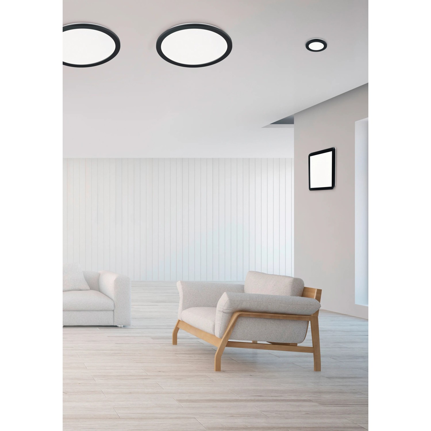 Moderne, schwarze Reality LED Deckenleuchte Camillus im Wohnraum.