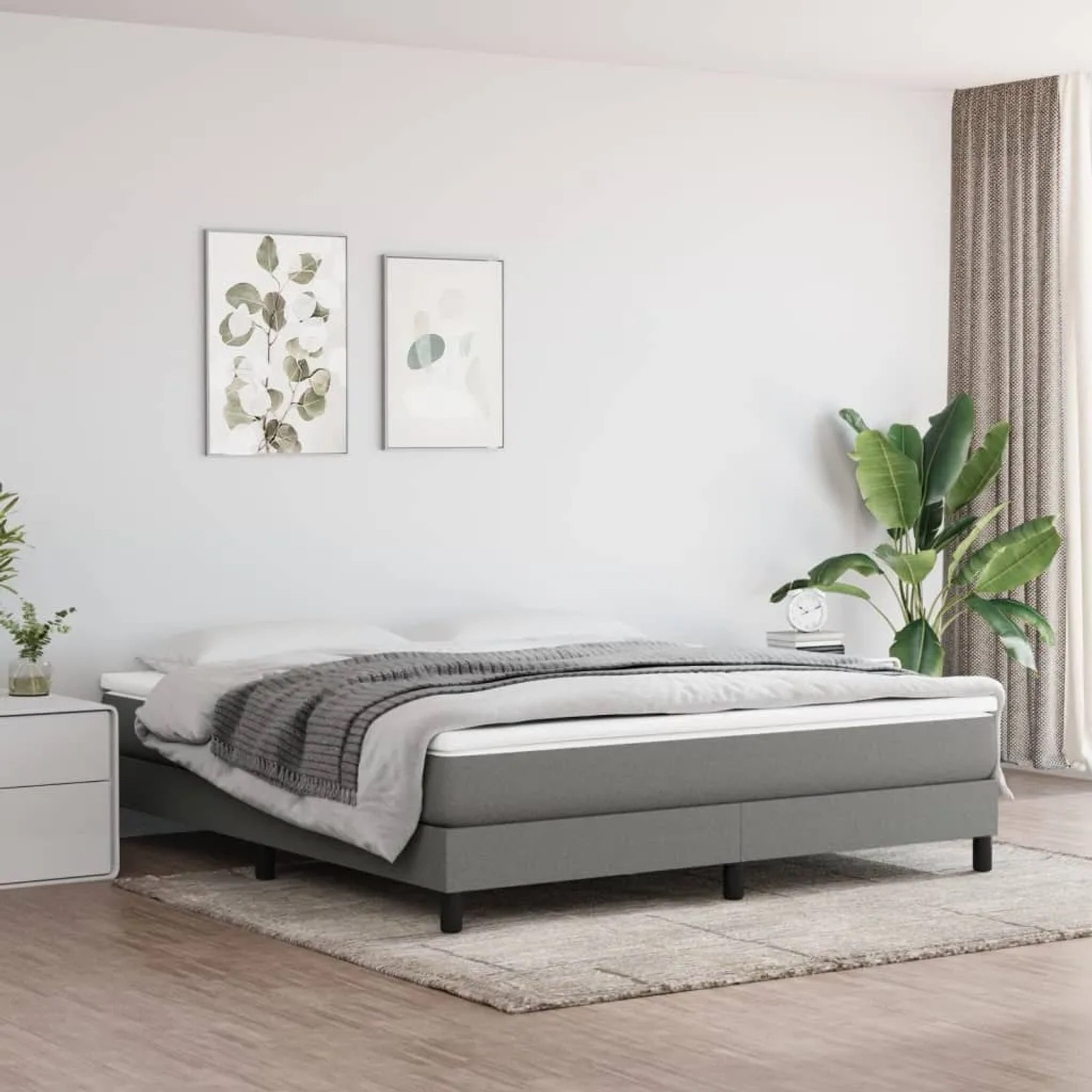 Dunkelgraues vidaXL Boxspringbett 180x200 cm mit Matratze und Topper im Schlafzimmer.