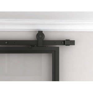 Detailaufnahme: Schwarze inova Loft Glasschiebetür mit Softclose und Stahlrahmen.