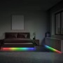 Schlafzimmer mit Brilo LED-Strip Magic RGB unter Bett und Schrank für dynamische Farbwechsel.