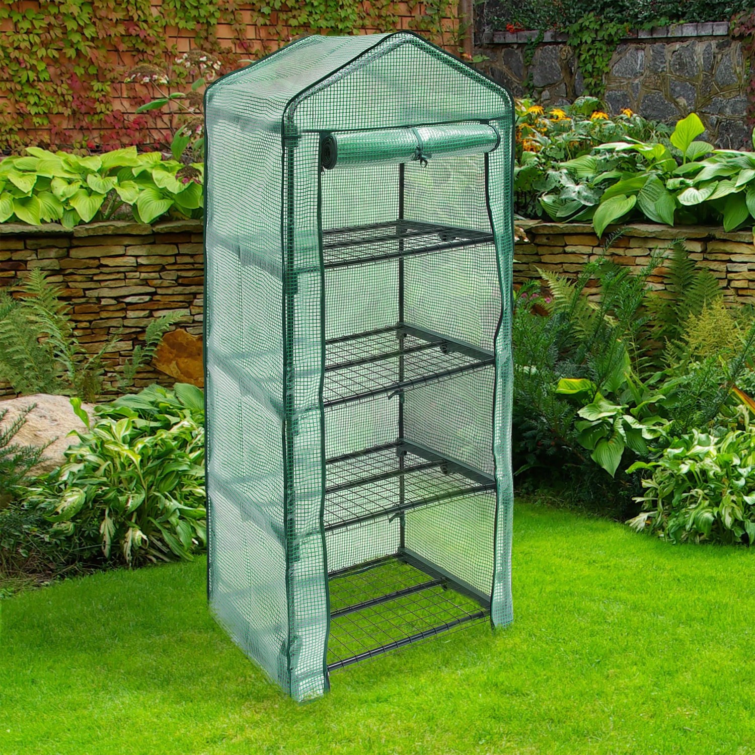 Grünes Foliengewächshaus mit 4 Gitterregalen, offener Front, auf Rasen im Garten. Ideal für Pflanzenanzucht.